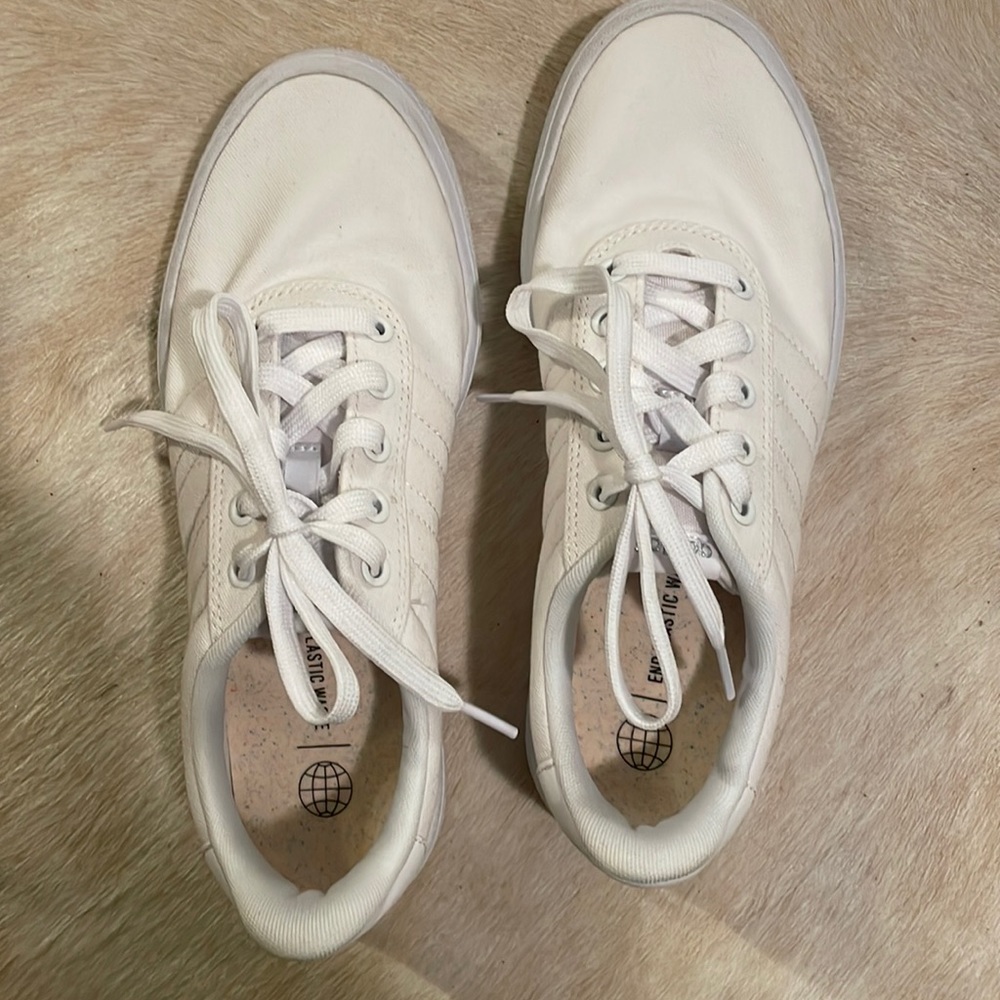 White canvas Adidas sneakers